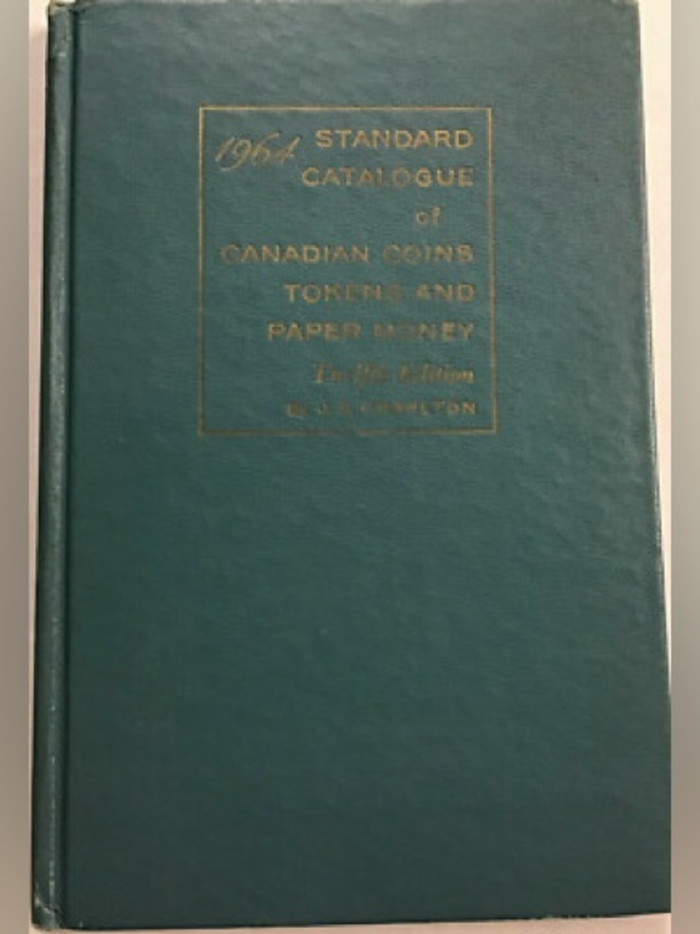 Vintage hardcover book identify Canadian coins and currency Canada rare coin
